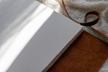 Hahnemuhle Baryta Bamboo fine art album from QTALBUMS with hand-torn, deckled-edge pages in special Journal-style cover.