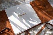 Hahnemuhle Baryta Bamboo fine art album from QTALBUMS with hand-torn, deckled-edge pages in special Journal-style cover.