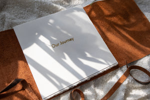 Hahnemuhle Baryta Bamboo fine art album from QTALBUMS with hand-torn, deckled-edge pages in special Journal-style cover.